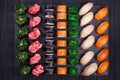 Tasty delicious multicolored appetizing nigiri sushi and rolls s Royalty Free Stock Photo