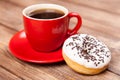 Tasty donut with a cup of coffee Royalty Free Stock Photo