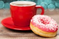 Tasty donut with a cup of coffee Royalty Free Stock Photo
