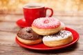 Tasty donut with a cup of coffee Royalty Free Stock Photo