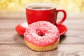 Tasty donut with a cup of coffee Royalty Free Stock Photo