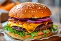 Tasty double beef burger isolated on transparent white background. Big fresh juicy cheeseburger fastfood with beef patty, tomatoes Royalty Free Stock Photo