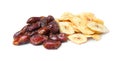 Tasty dried bananas and dates on white background Royalty Free Stock Photo