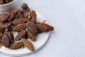 Tasty dried dates on light table, closeup. Space for text Royalty Free Stock Photo