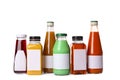Tasty drinks in bottles with blank labels on white background Royalty Free Stock Photo
