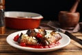 Tasty eggplant rolls served on wooden table, closeup Royalty Free Stock Photo