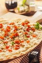 Tasty Elsass Alsace pizza on a thin crispy base