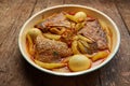 Tasty fish curry cooked in coconut milk on wooden table Royalty Free Stock Photo