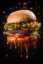 Tasty flying burger on black background. Food levitation. Royalty Free Stock Photo