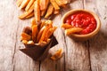 Tasty food: sweet potato fries with rosemary and herbs and ketch Royalty Free Stock Photo