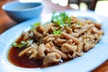 Steamed duck intestine in brown soy soup