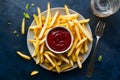 Tasty french fries with ketchup presented on a plate