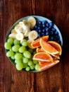 Tasty fresh fruit ona serving plate from above Royalty Free Stock Photo