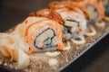 Tasty and fresh maki sushi rolls. Delicious Japanese food. Selective focus Royalty Free Stock Photo