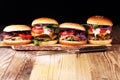 Tasty fresh meat burgers with salad and cheese. Homemade angus b Royalty Free Stock Photo