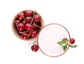 Tasty fresh milk shake with cherries on white background, top view Royalty Free Stock Photo