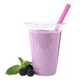 Tasty fresh milk shake in plastic cup and blackberries on white background Royalty Free Stock Photo