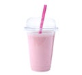 Tasty fresh milk shake in plastic cup on background Royalty Free Stock Photo