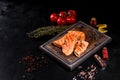 Tasty fresh red fish arctic char baked on a grill Royalty Free Stock Photo