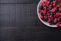 Tasty fresh ripe raspberry, blackberry, gooseberry and red currant berries in plate, healthy food fruit Royalty Free Stock Photo