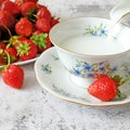 Tasty fresh strawberry with milk sour cream or yogurt closeup, dessert with strawberries