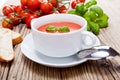 Tasty fresh tomato soup basil and bread Royalty Free Stock Photo