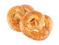 Tasty freshly baked pretzels on white background, top view