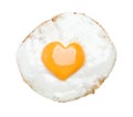 Tasty fried egg with yolk in shape of heart on white background, top view Royalty Free Stock Photo