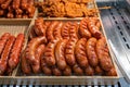 Tasty fried sausage for sale at street food night market Royalty Free Stock Photo