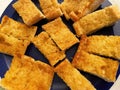 Tasty Garlic Bread Appetizer Served on a Blue Plate Royalty Free Stock Photo