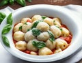 Tasty gnocchi with tomato sauce and basil in bowl, closeup Ai generated