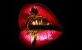 Tasty golden lips. Shiny sexy mouth. Expensive makeup, rich life. Mouth icon on black background. Lips full shape