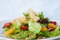 Tasty green salad with cheese and fruits Royalty Free Stock Photo