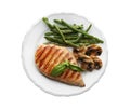Tasty grilled chicken fillet with green beans, mushrooms and basil isolated on white Royalty Free Stock Photo