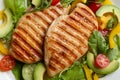 Tasty grilled chicken fillets with vegetables on plate, closeup Royalty Free Stock Photo