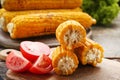 Tasty grilled corns with tomatoes Royalty Free Stock Photo