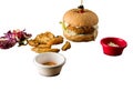 Tasty grilled home made burger with beef, tomato, cheese, cucumber and lettuce on a plain background. Top view. fast food and junk Royalty Free Stock Photo