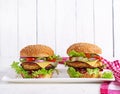 Tasty grilled homemade hamburger with burger chicken, tomato, cheese Royalty Free Stock Photo