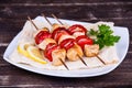 Tasty grilled meat and vegetables on skewer Royalty Free Stock Photo