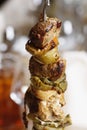 Tasty grilled meat and vegetables on skewer Royalty Free Stock Photo