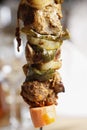 Tasty grilled meat and vegetables on skewer Royalty Free Stock Photo
