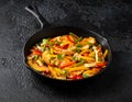 Tasty Halloumi cheese Fajitas with mix pepper in iron cast pan. Healthy food. Royalty Free Stock Photo