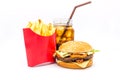 Tasty hamburger, French fries and cola isolated on white background. Royalty Free Stock Photo