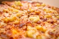 Tasty hawaiian pizza with ham and pineapple Royalty Free Stock Photo