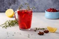 Tasty and healthy cranberry juice cranberry mors with thyme and lemon Royalty Free Stock Photo