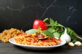 Tasty and Healthy Wholemeal Fusilli Pasta in Tomato Sauce with Fresh Ingredients Royalty Free Stock Photo
