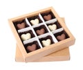 Tasty heart shaped chocolate candies in box isolated on white. Valentine`s day celebration Royalty Free Stock Photo