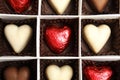 Tasty heart shaped chocolate candies in box, top view. Valentine`s day celebration Royalty Free Stock Photo