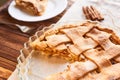 Tasty homemade apple pie. American pie. Apples. Cinnamon. Plate. Linen towel. Wooden background. Top view Royalty Free Stock Photo