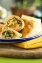 Tasty homemade baked puff pastry pies stuffed with chicken, cheese and pepper on green background close-up.healthy eating concept